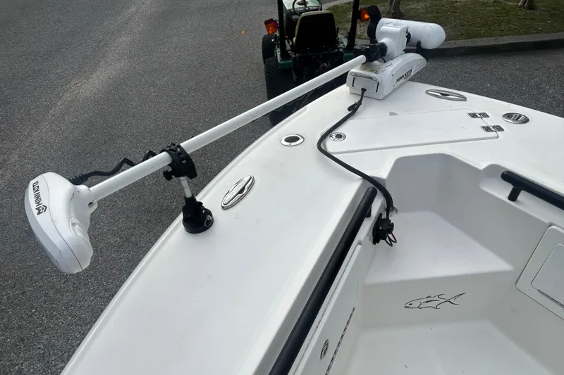 Slide: The Image of 2022 Crevalle 26 HBW boat with Minn Kota trolling motor on deck. - 19