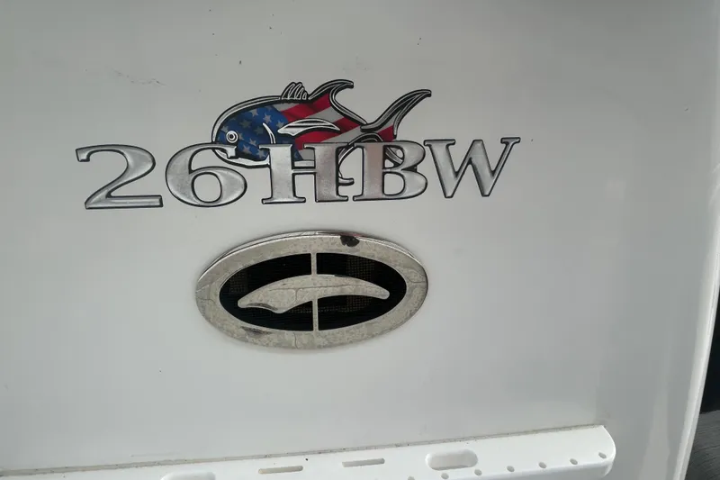 Slide: The Image of Crevalle 26 HBW 2022 boat emblem with patriotic fish design. - 25