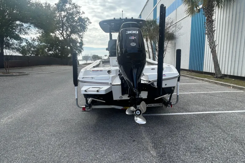 Slide: The Image of 2022 Crevalle 26 HBW boat with powerful outboard motor in parking lot. - 5