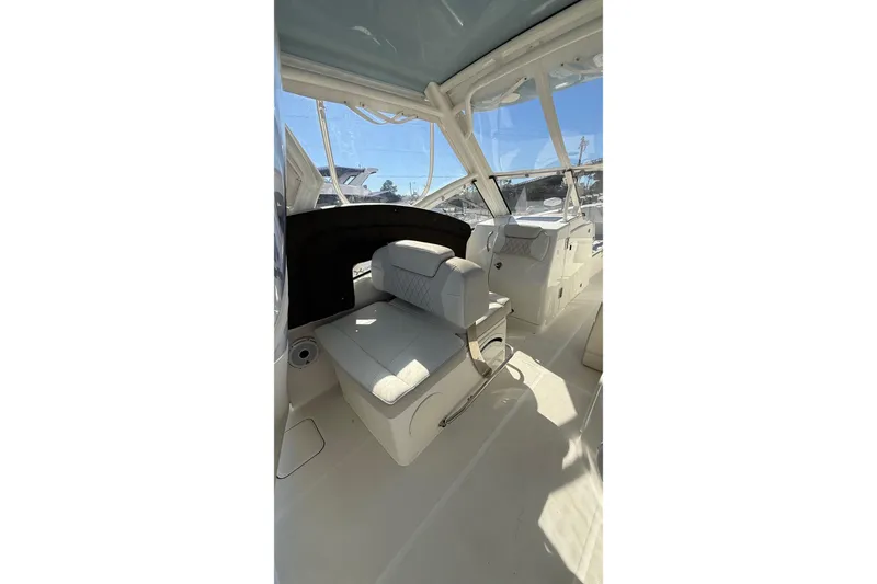 Slide: The Image of 2023 World Cat 280 DC-X boat interior with luxurious seating and modern design. - 42