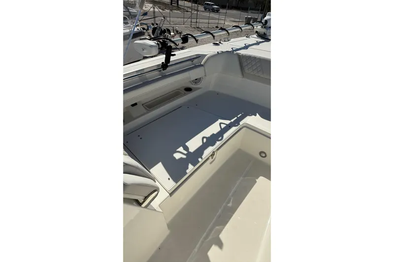 Slide: The Image of 2023 World Cat 280 DC-X boat interior with seating and rod holders. - 47