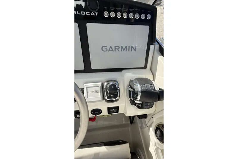 Slide: The Image of Control panel of 2023 World Cat 280 DC-X boat with Garmin display. - 59