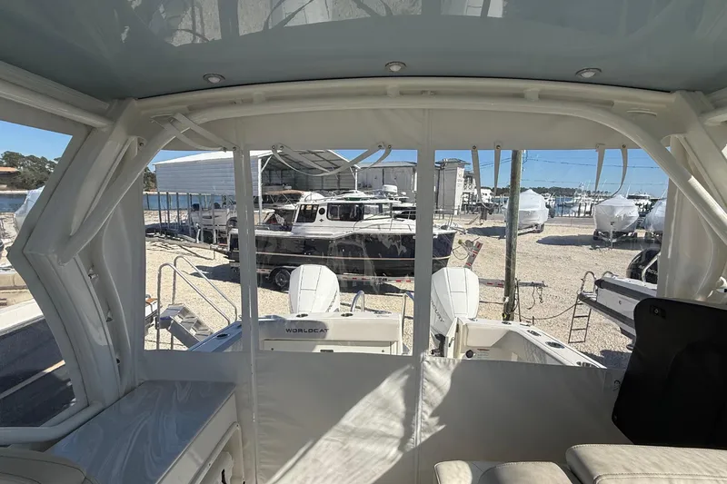 Slide: The Image of Interior view of 2023 World Cat 280 DC-X boat at a marina. - 63
