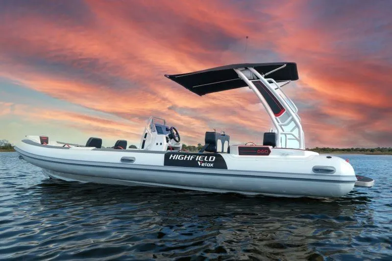 Slide: The Image of 2026 Highfield 660 Velox boat on water at sunset. - 4