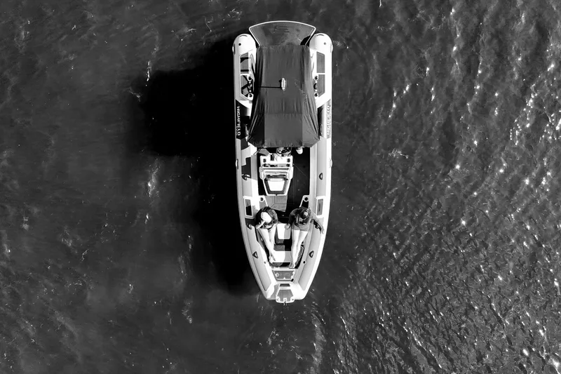 Slide: The Image of Aerial view of 2026 Highfield 660 Velox boat on water. - 5