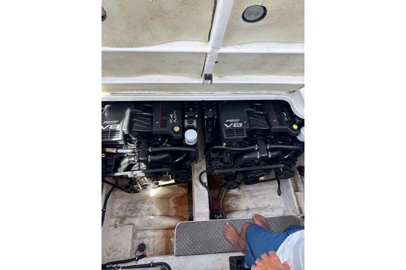 Slide: The Image of Engine compartment of a 2000 Formula 31 Performance Cruiser with twin Mercury V8 engines. - 10