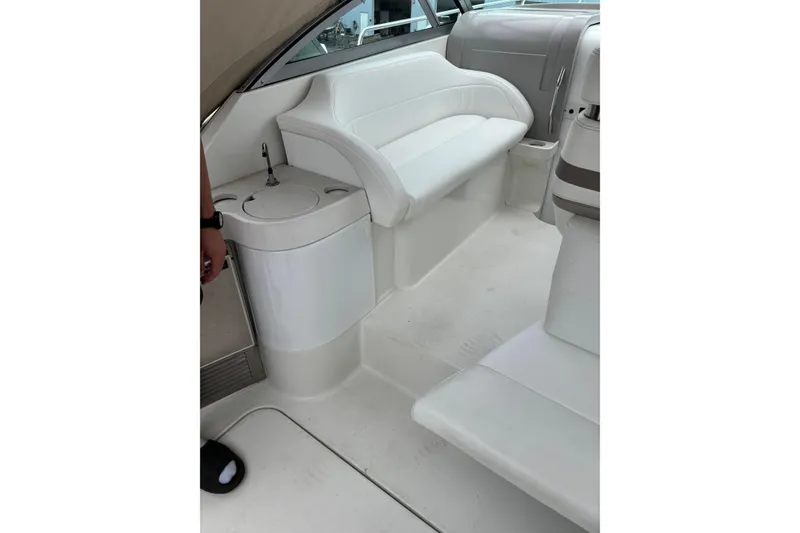 Slide: The Image of 2000 Formula 31 Performance Cruiser interior with white seating and compact sink. - 6