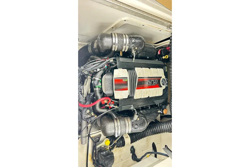 Slide: The Image of Engine of 2018 Sea Ray SDX 270 boat, showcasing detailed components. - 21