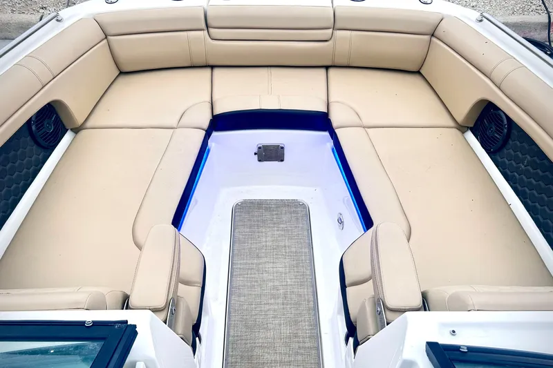 Slide: The Image of 2018 Sea Ray SDX 270 boat interior with beige seating and modern design. - 3