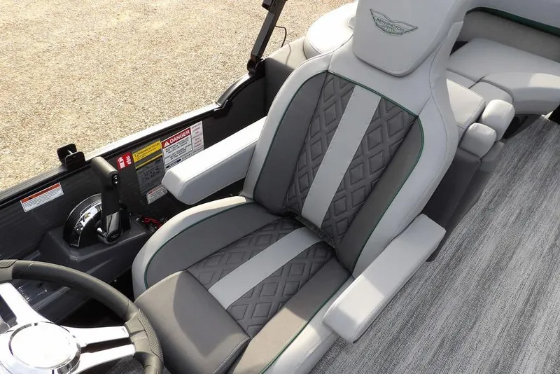 Slide: The Image of 2026 Bennington M Quad Bench 22 MFB boat seat with elegant gray upholstery and diamond pattern. - 24