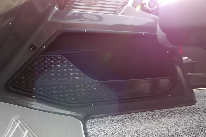 Slide: The Image of 2026 Bennington M Quad Bench 22 MFB interior detail with textured panel and sunlight. - 25