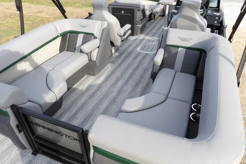 Slide: The Image of 2026 Bennington M Quad Bench 22 MFB pontoon boat interior with luxurious seating. - 29