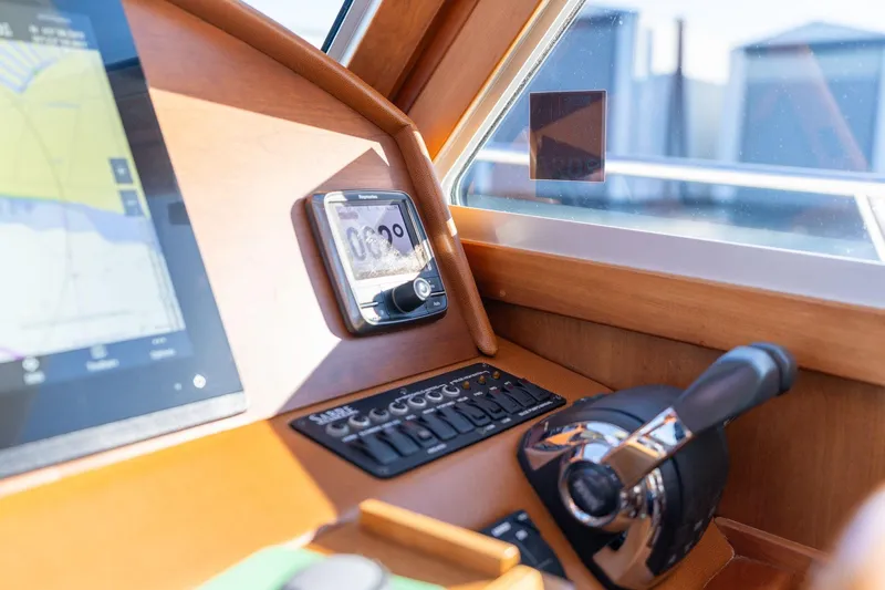 Slide: The Image of Control panel of 2013 Sabre 38 Salon Express yacht with navigation equipment. - 20