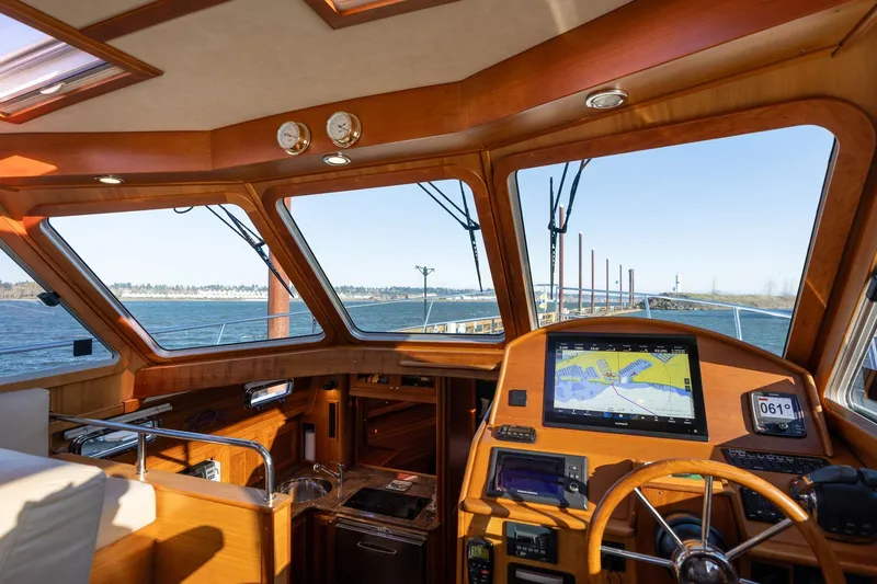 Slide: The Image of Interior view of 2013 Sabre 38 Salon Express yacht cockpit with navigation equipment. - 23