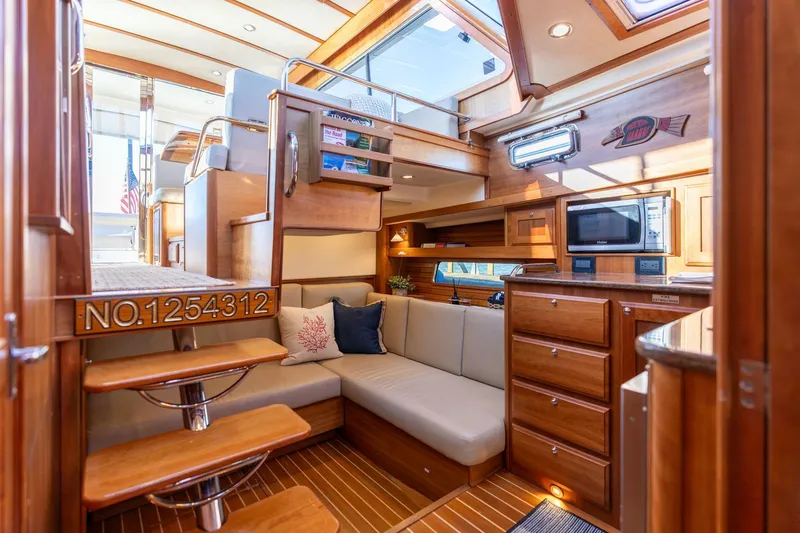 Slide: The Image of Luxurious interior of 2013 Sabre 38 Salon Express yacht with elegant wood finish. - 25