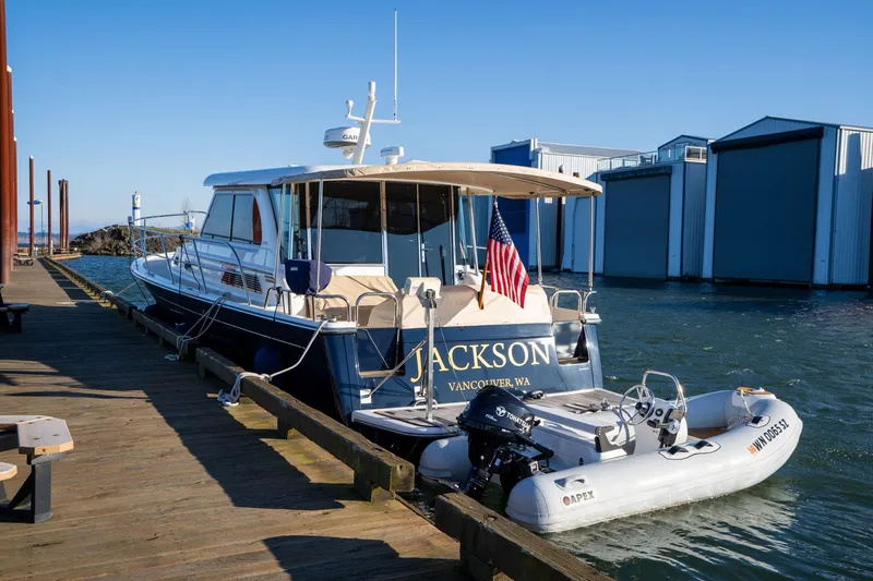 Slide: The Image of 2013 Sabre 38 Salon Express yacht docked with dinghy, Vancouver, WA. - 3