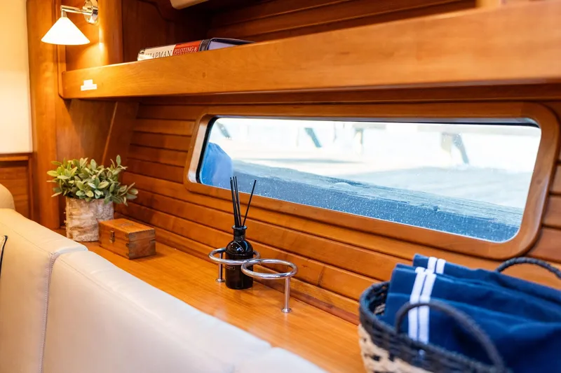 Slide: The Image of Interior of 2013 Sabre 38 Salon Express with wooden accents and cozy decor. - 39