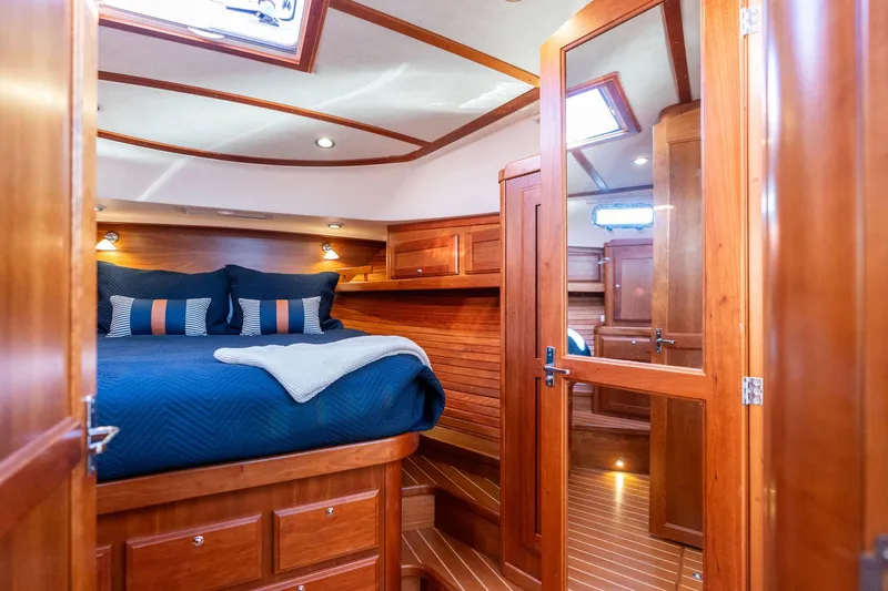 Slide: The Image of Luxurious interior of 2013 Sabre 38 Salon Express yacht cabin with wooden finish. - 40