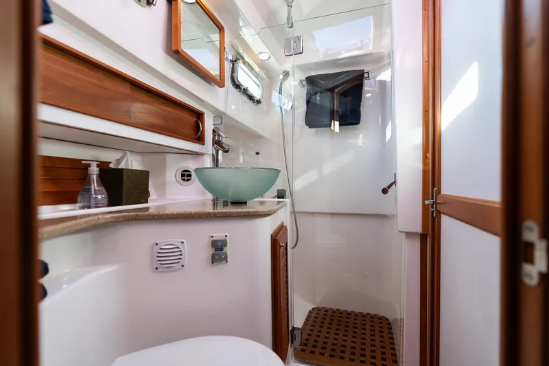 Slide: The Image of Luxurious bathroom in 2013 Sabre 38 Salon Express yacht with modern fixtures. - 45