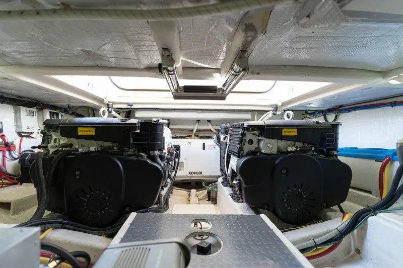 Slide: The Image of Engine room of 2013 Sabre 38 Salon Express with dual engines and Kohler generator. - 92