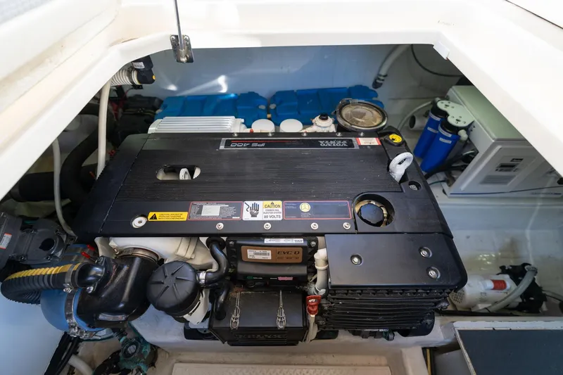 Slide: The Image of Engine room of 2013 Sabre 38 Salon Express, featuring Volvo Penta engine components. - 98