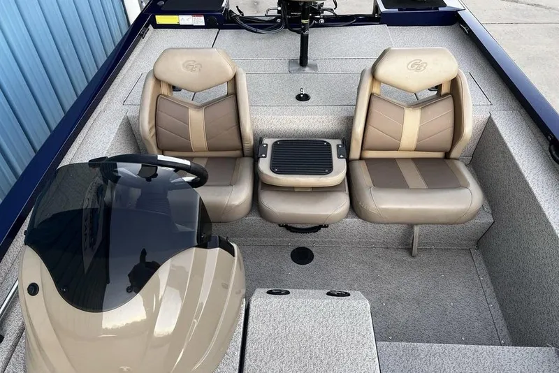 Slide: The Image of 2023 G3 Sportsman 1710 boat interior with dual seats and steering console. - 18