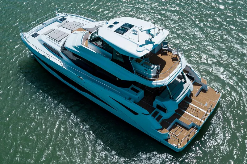 Slide: The Image of Manufacturer Provided Image: Aquila 70 Luxury yacht 2026 on water, aerial view, sleek design, spacious decks. - 3