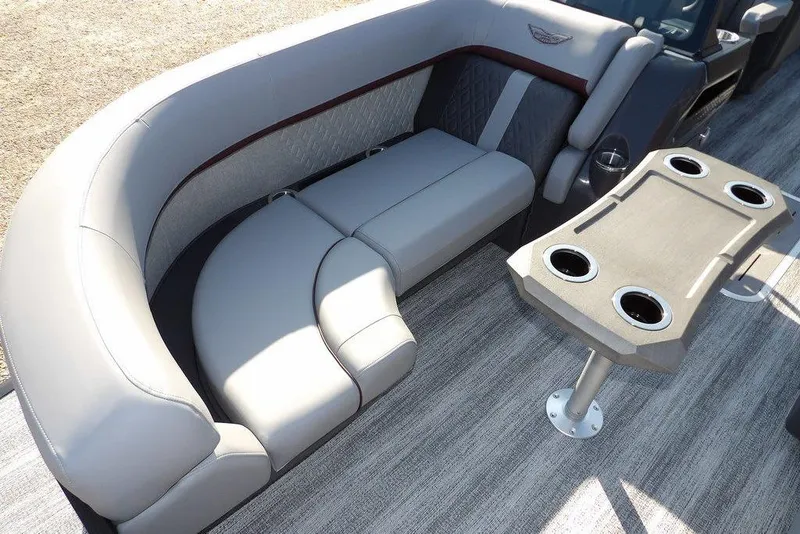 Slide: The Image of Luxurious seating on 2026 Bennington M Quad Bench 22 MFB pontoon boat with cupholders. - 11