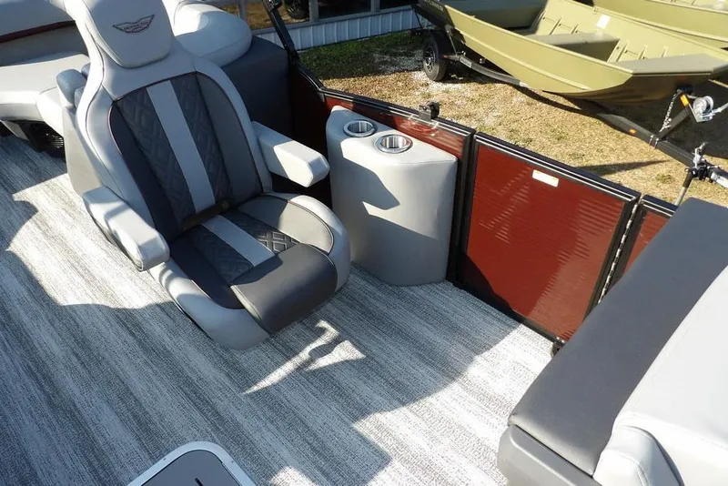 Slide: The Image of Luxurious seating on 2026 Bennington M Quad Bench 22 MFB pontoon boat interior. - 16