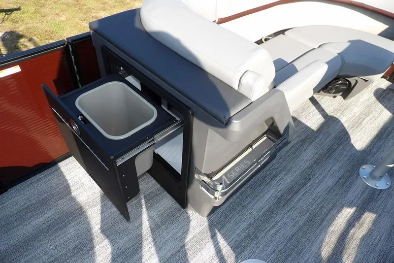 Slide: The Image of Bennington M Quad Bench 22 MFB 2026 with integrated storage and seating on a boat deck. - 20
