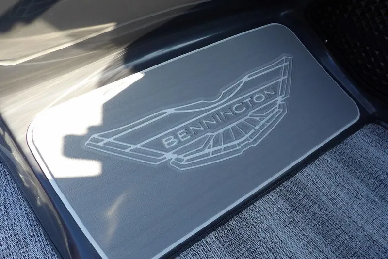 Slide: The Image of Bennington logo on 2026 M Quad Bench 22 MFB boat floor mat. - 23