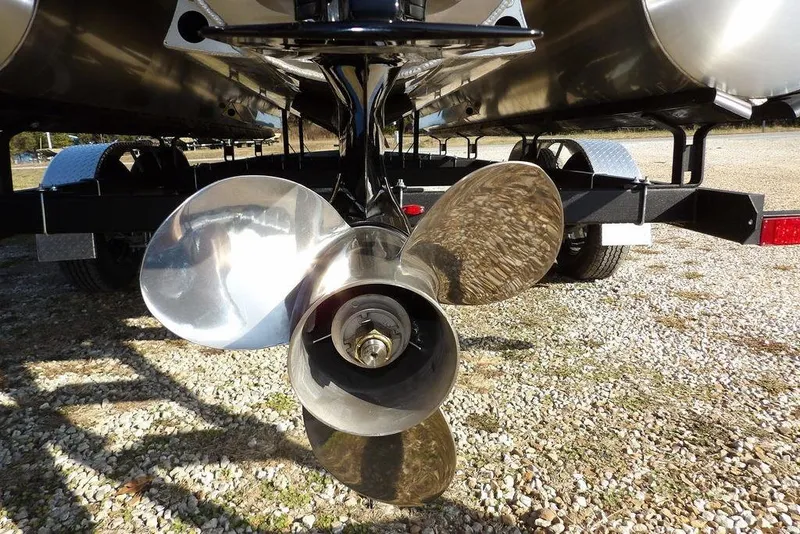 Slide: The Image of Close-up of a 2026 Bennington M Quad Bench 22 MFB boat propeller. - 36