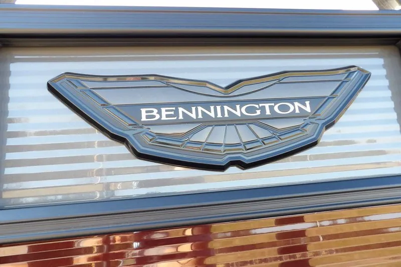 Slide: The Image of 2026 Bennington M Quad Bench 22 MFB logo on sleek metallic surface. - 45