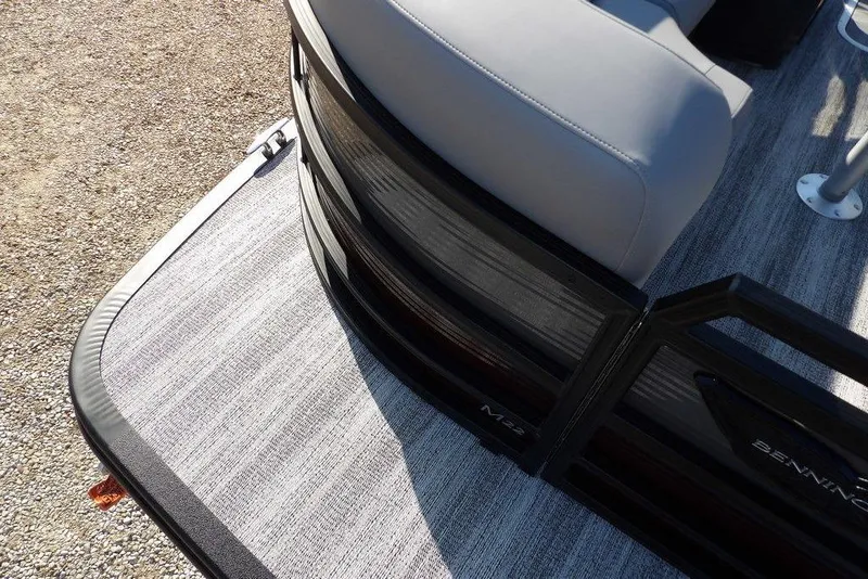Slide: The Image of 2026 Bennington M Quad Bench 22 MFB pontoon boat, featuring sleek design and comfortable seating. - 7