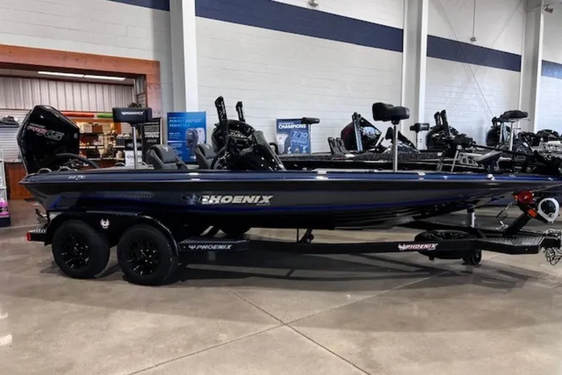 The Image of 2026 Phoenix 919 ZXL boat displayed in showroom, featuring sleek design and modern equipment. - 0
