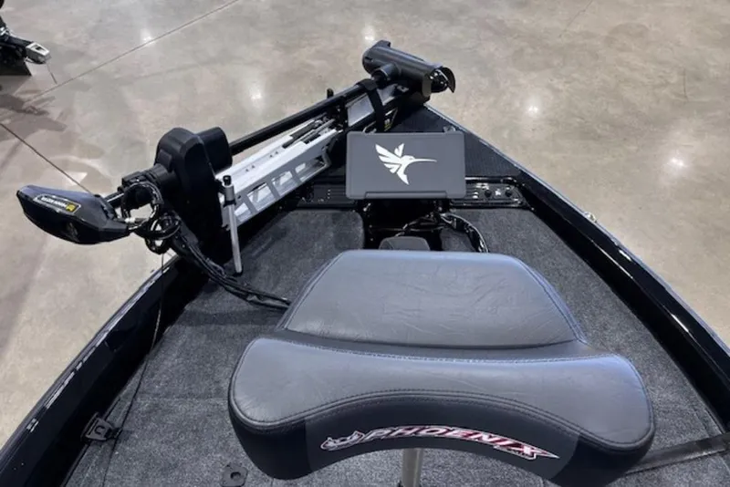 Slide: The Image of 2026 Phoenix 919 ZXL boat interior with advanced control panel and seating. - 11