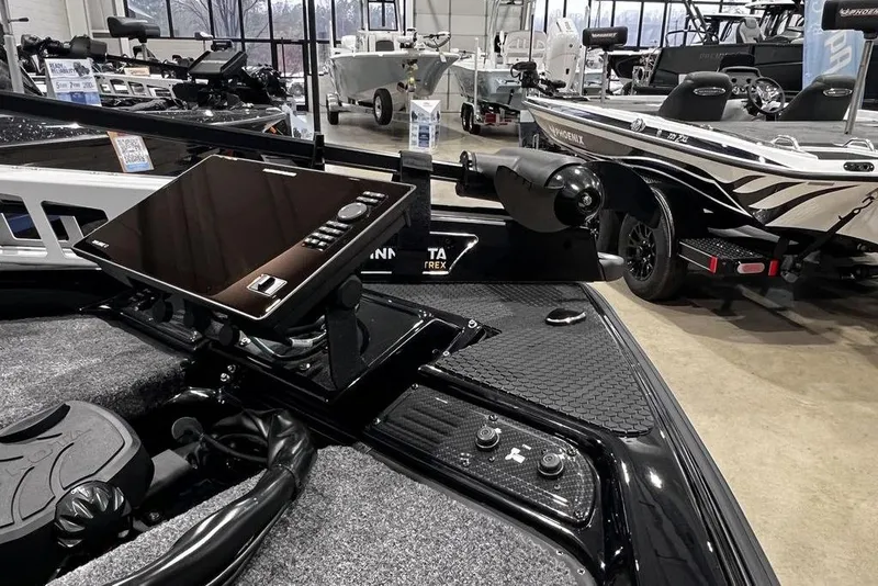 Slide: The Image of 2026 Phoenix 919 ZXL boat interior with advanced control panel and sleek design. - 14