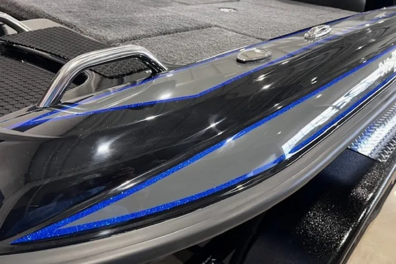 Slide: The Image of 2026 Phoenix 919 ZXL boat detail with sleek black and blue accents. - 6
