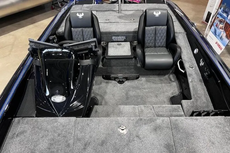 Slide: The Image of 2026 Phoenix 919 ZXL boat interior with dual seats and modern dashboard. - 7