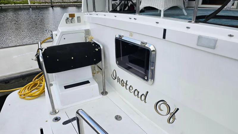 Slide: The Image of 2005 Jefferson Marquessa 60 MY yacht stern with seating and nameplate. - 16