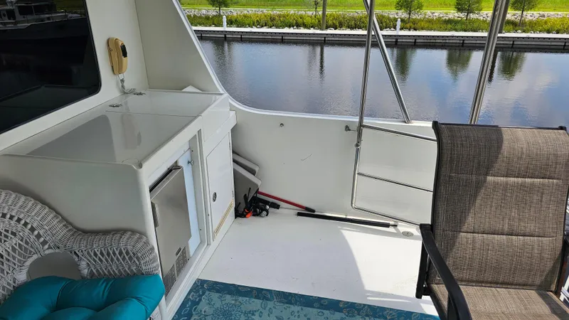 Slide: The Image of 2005 Jefferson Marquessa 60 MY yacht deck with seating and water view. - 21