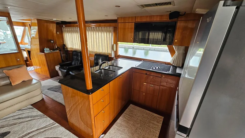 Slide: The Image of Luxurious interior of 2005 Jefferson Marquessa 60 MY yacht with modern kitchen amenities. - 27