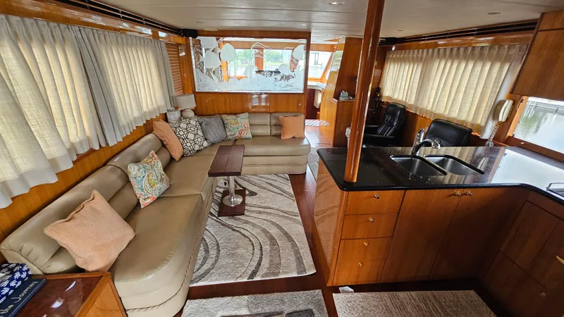 Slide: The Image of Luxurious interior of 2005 Jefferson Marquessa 60 MY yacht with elegant seating and kitchen area. - 28