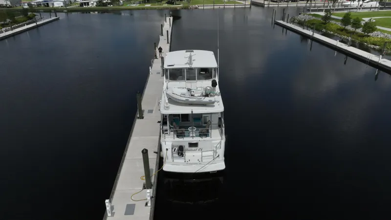 Slide: The Image of 2005 Jefferson Marquessa 60 MY yacht docked at marina, aerial view. - 3