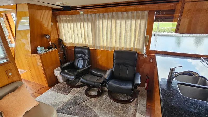 Slide: The Image of Luxurious interior of 2005 Jefferson Marquessa 60 MY yacht with leather chairs and wood finish. - 33
