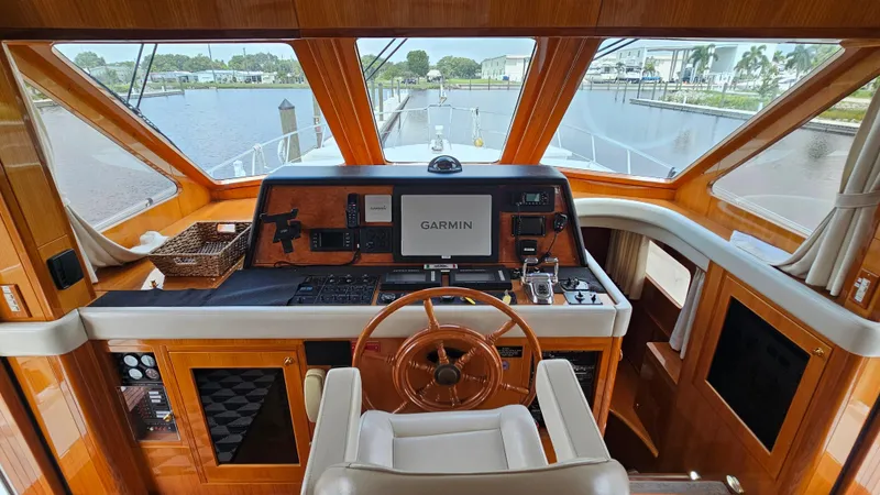 Slide: The Image of Luxurious helm of 2005 Jefferson Marquessa 60 MY yacht with Garmin navigation system. - 35