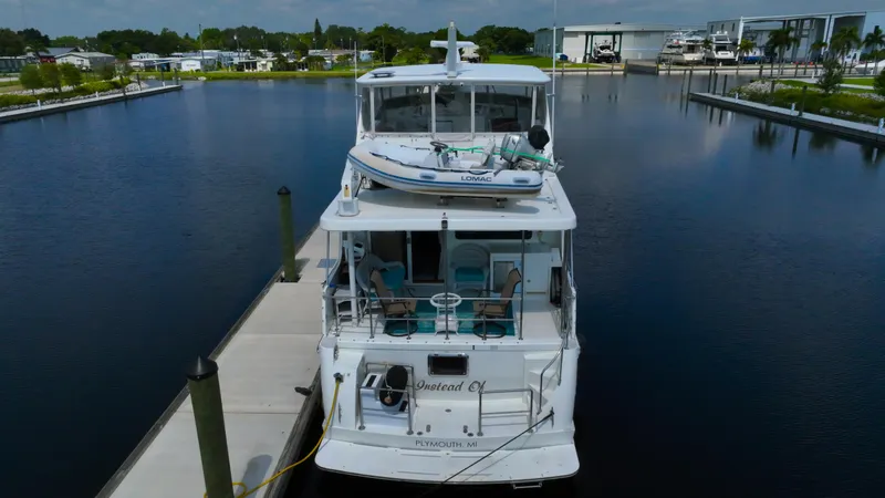 Slide: The Image of Jefferson Marquessa 60 MY 2005 yacht docked at marina with calm waters. - 4