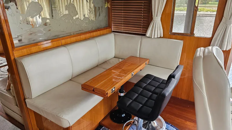 Slide: The Image of Luxurious interior of 2005 Jefferson Marquessa 60 MY yacht with elegant seating and wooden accents. - 44