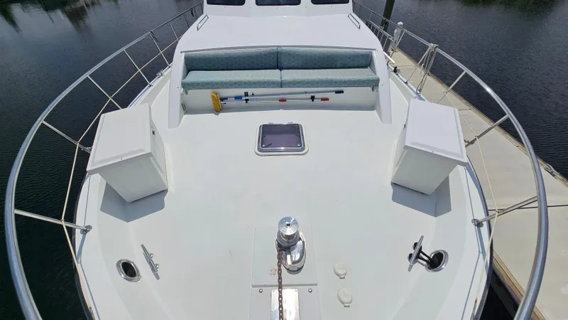 Slide: The Image of 2005 Jefferson Marquessa 60 MY yacht deck with seating and storage compartments. - 48