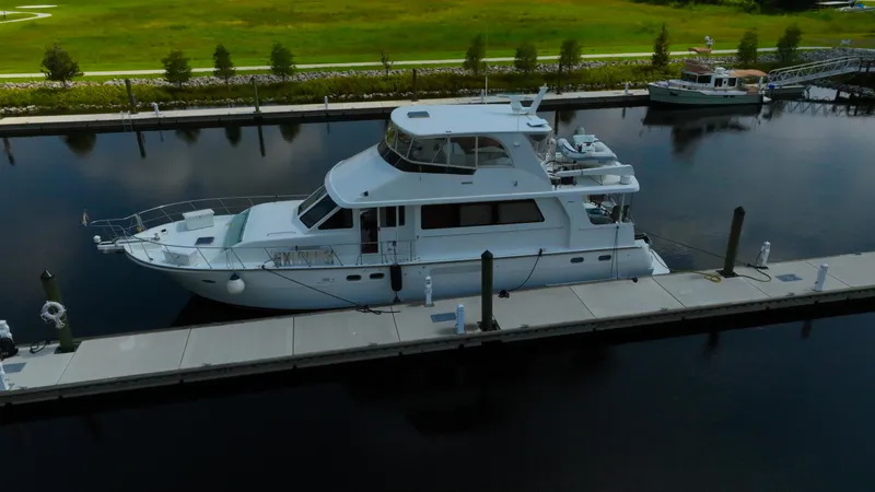 Slide: The Image of Aerial view of 2005 Jefferson Marquessa 60 MY yacht docked at marina. - 9